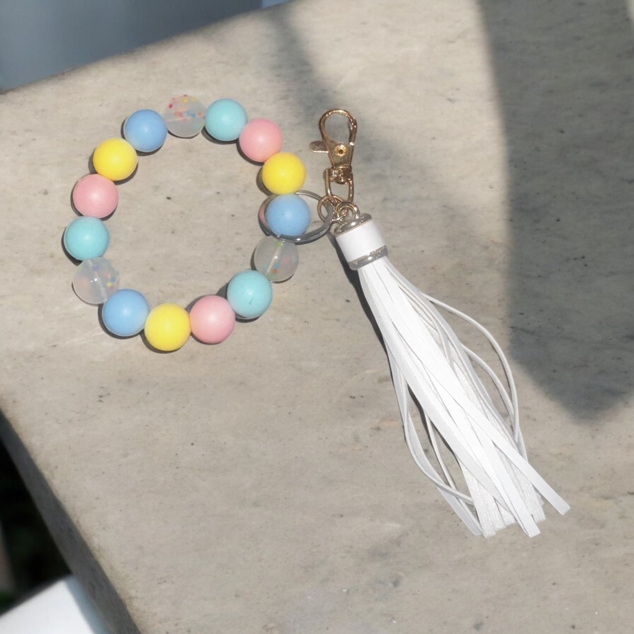 Blue/Yellow/Pink/Green/Pok-a-dot Tassle Wristlet