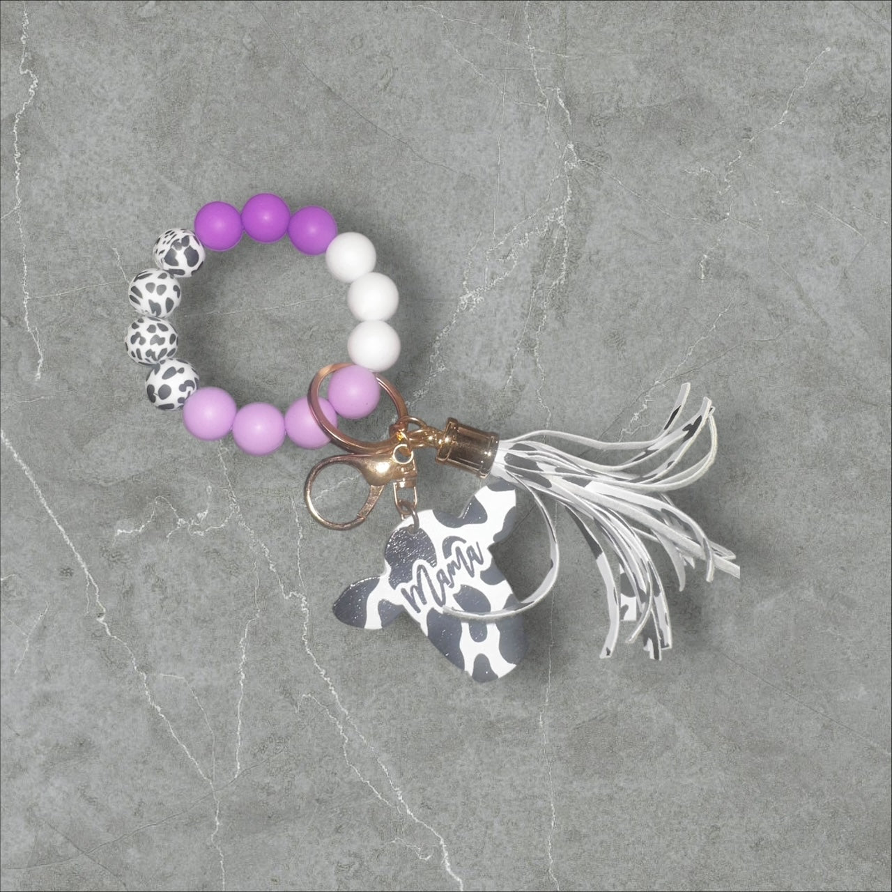 Cow Print MAMA Tassle Wristlet