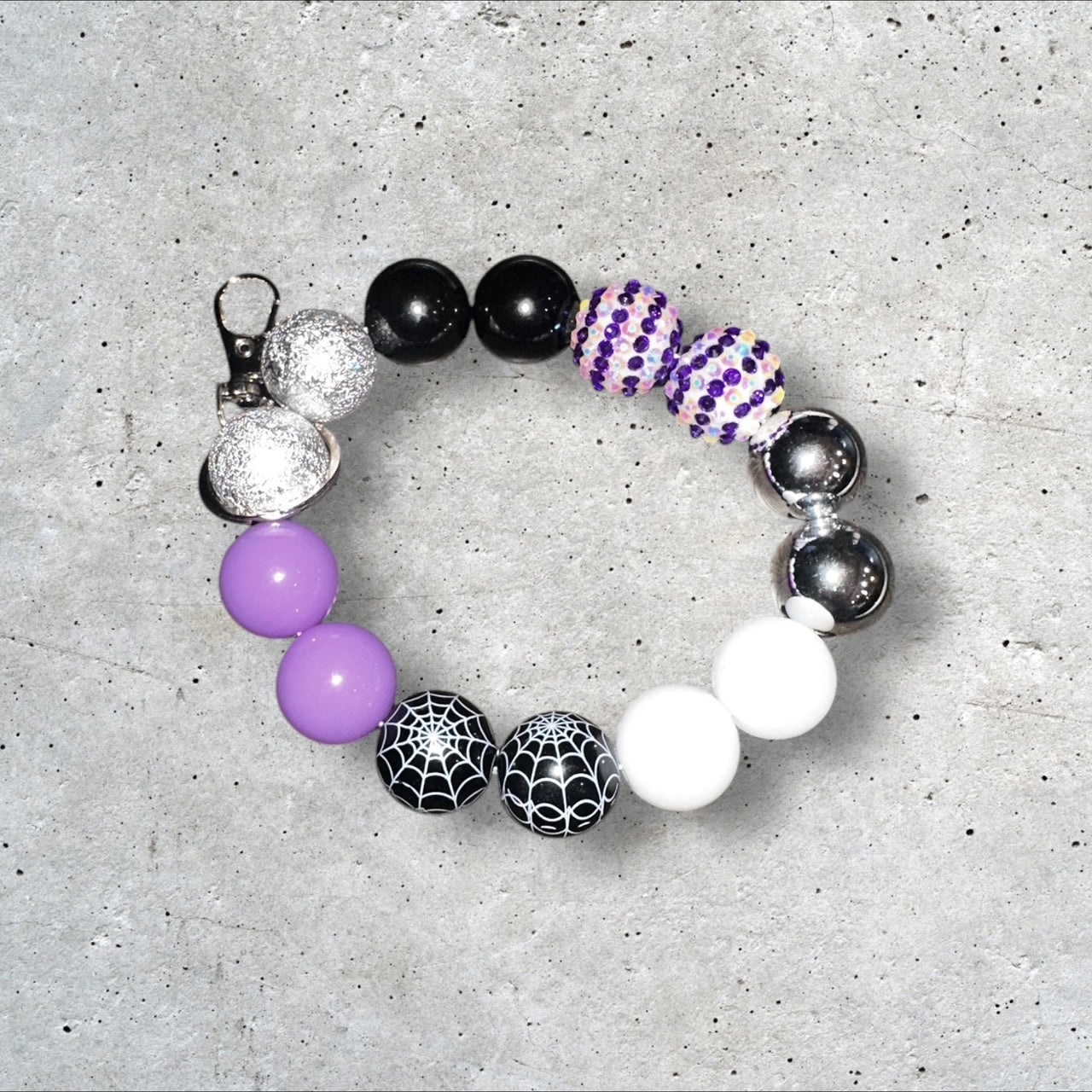 White/Black/Purple/Sparkle/Spider Web Wristlet