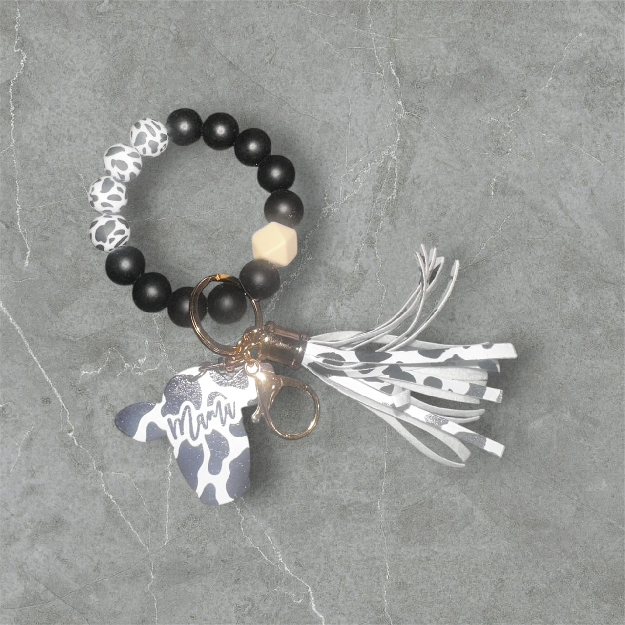 Cow Print MAMA Tassle Wristlet