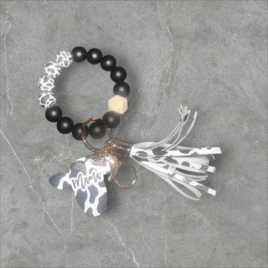 Cow Print MAMA Tassle Wristlet