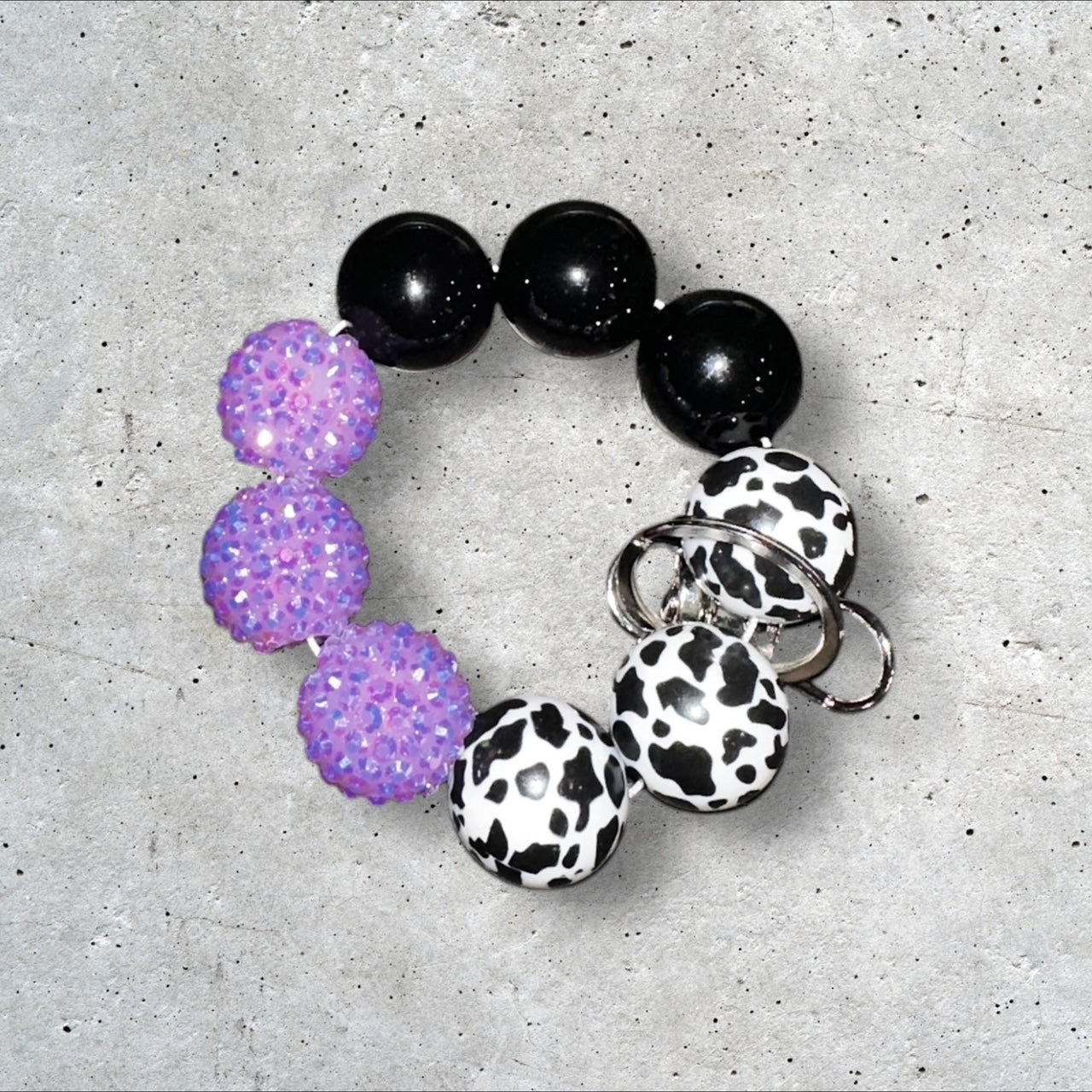 Mini Beaded Cow Print Wristlet